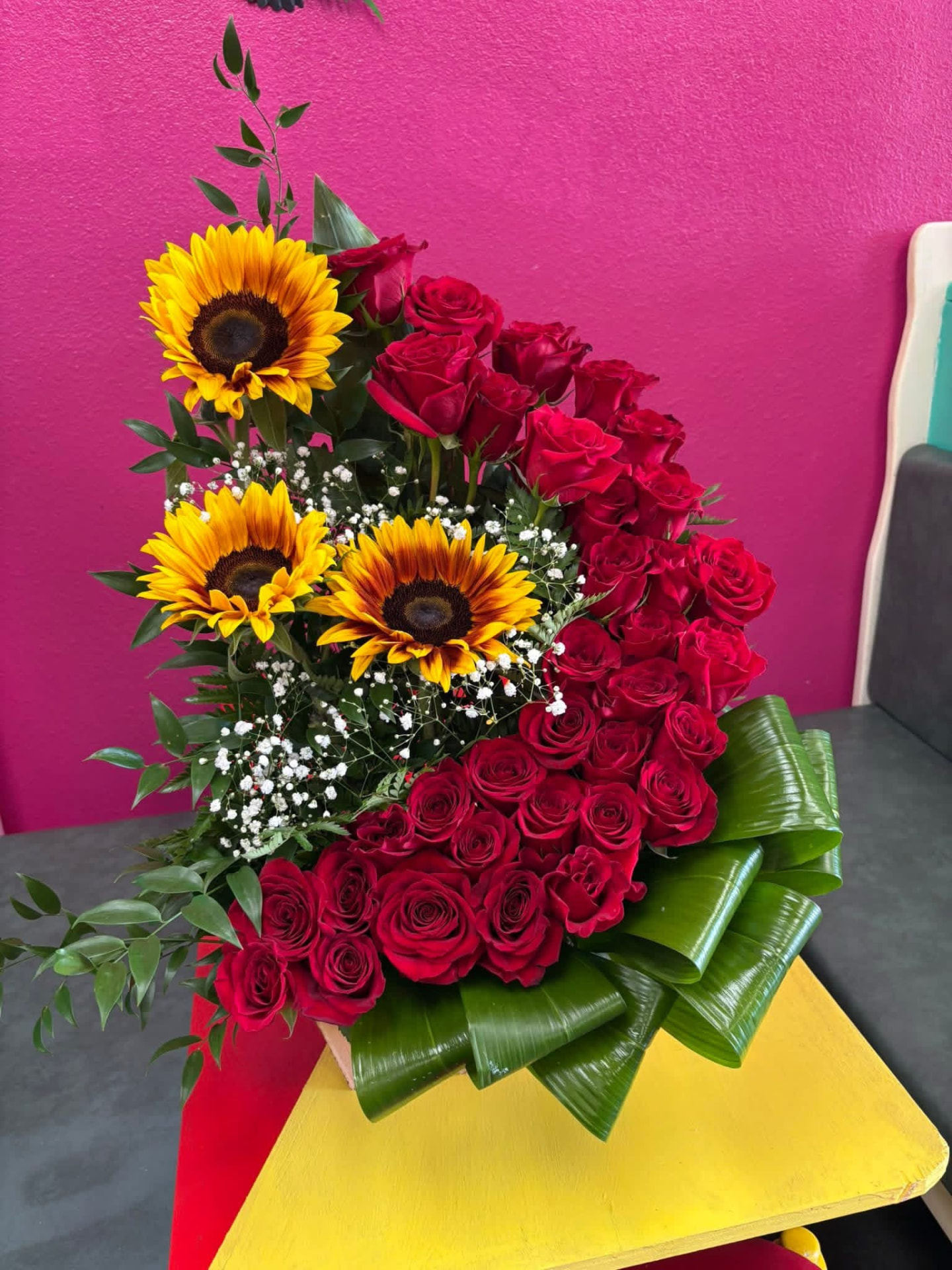 50 Roses & 3 Sunflowers